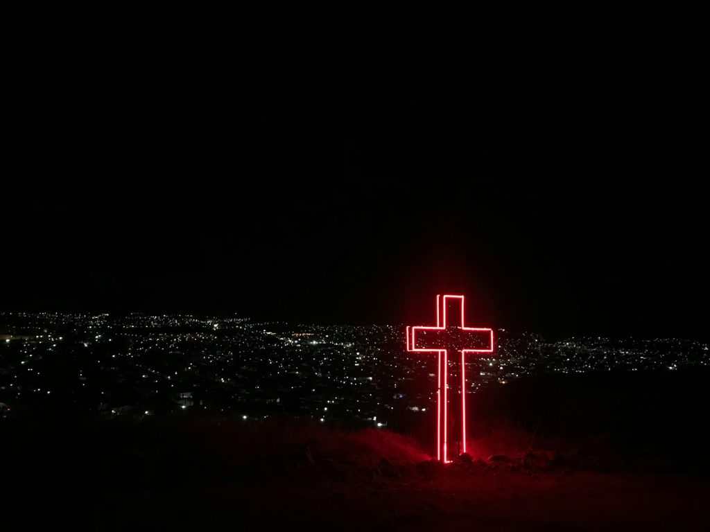 red neon light cross signage